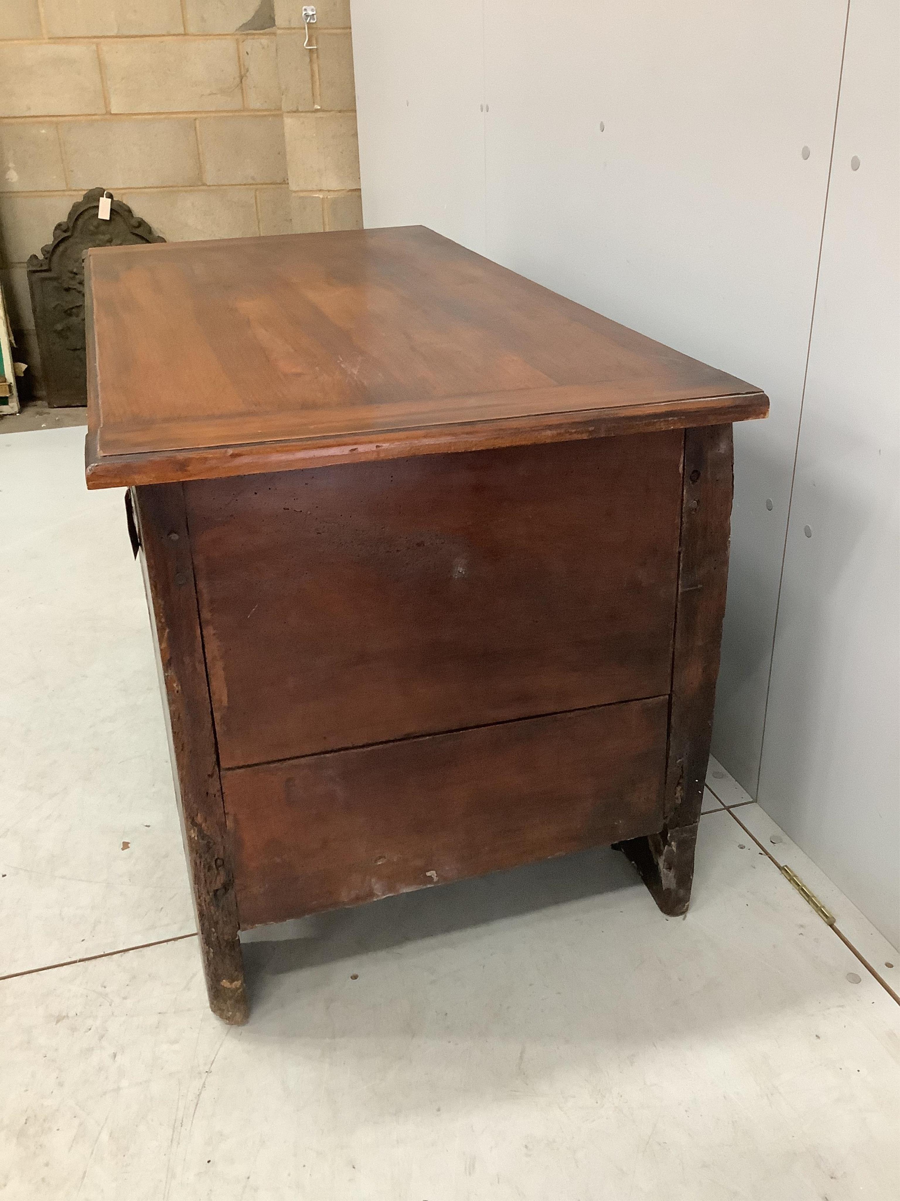 An 18th century and later French oak and fruit wood coffer, width 129cm, depth 65cm, height 71cm. Condition - fair, with later top